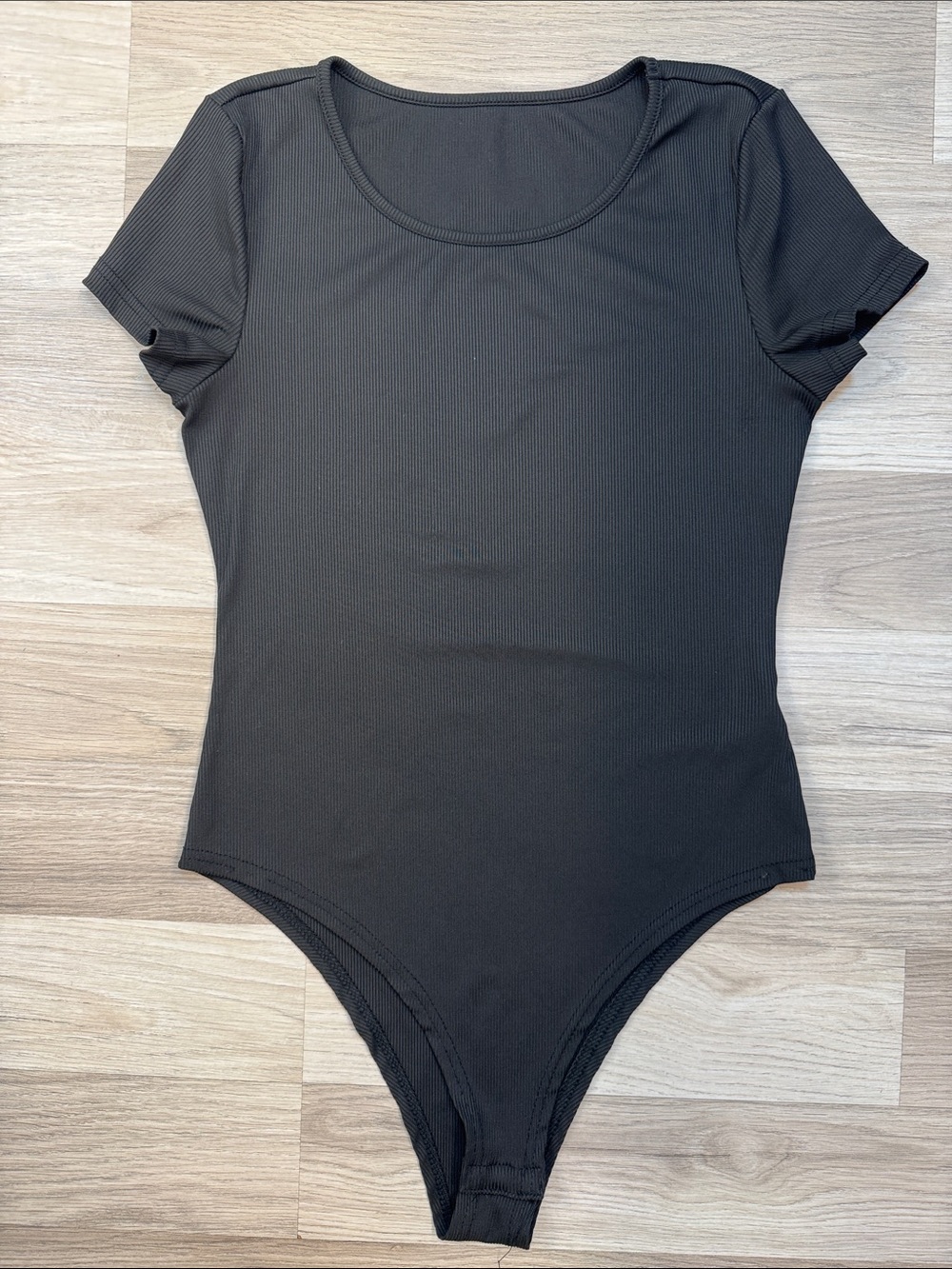 Women’s black body suit